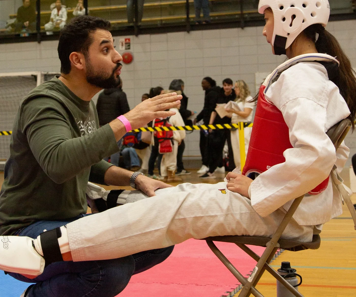 M.T.L Taekwondo coach preparing a young competitor